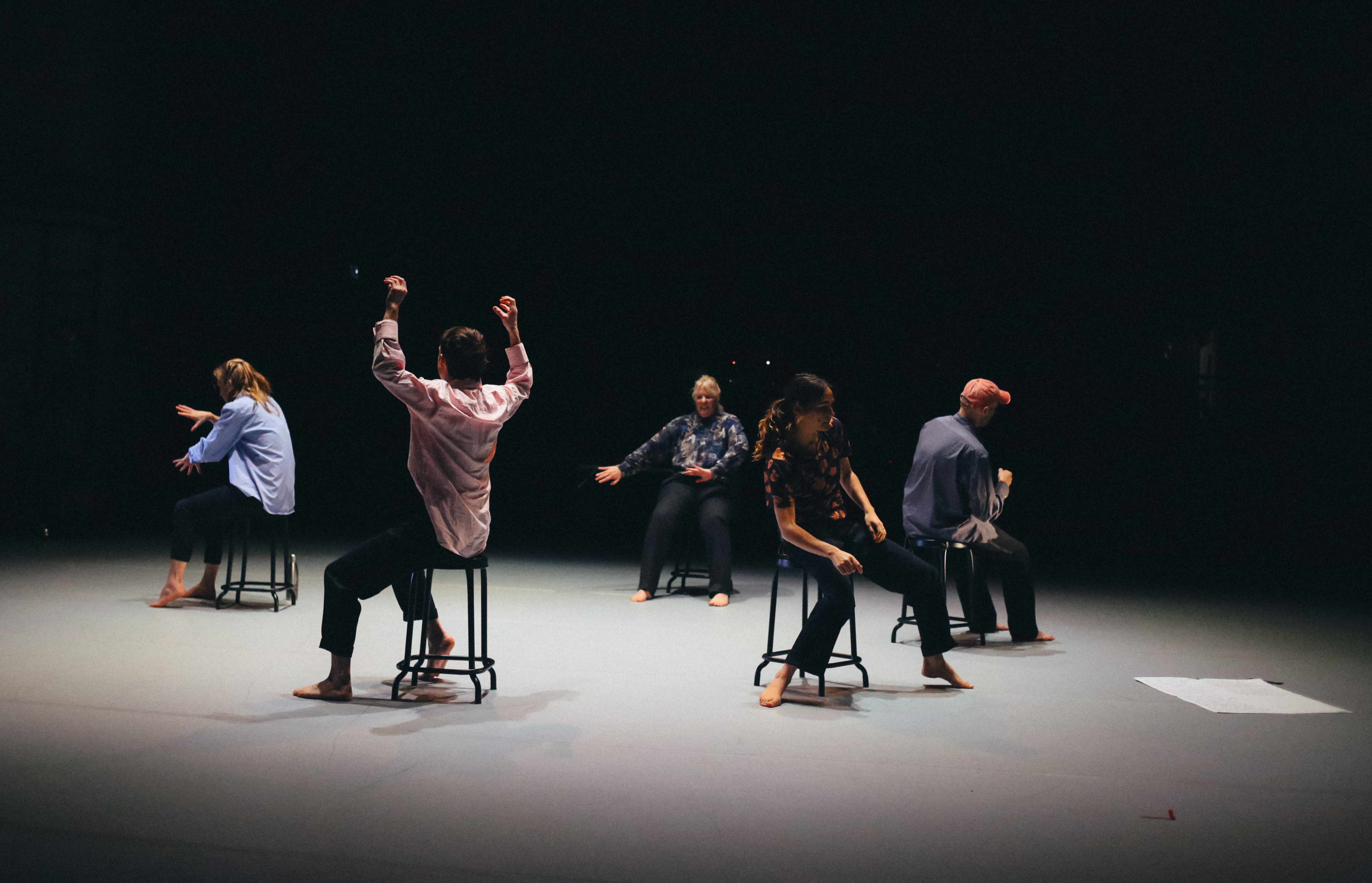5 dancers on chairs